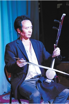 一位民間板胡藝人的逐夢(mèng)之路（圖）